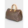 Коричнева шкіряна сумка Speedy з фірмовим забарвленням бренду
