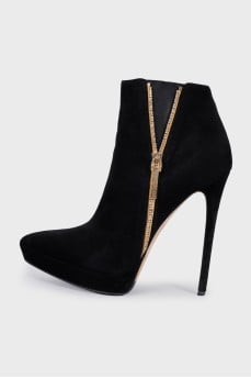 Black suede ankle boots with heels and embellishments