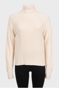 Beige knitted turtleneck sweater