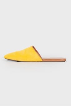 Yellow pony skin mules