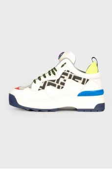 Sneakers with iridescent logo