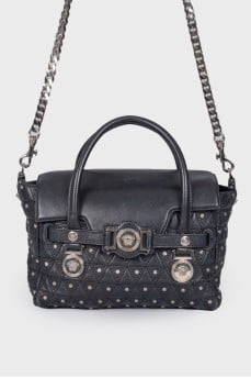 Leather bag with a textured logo