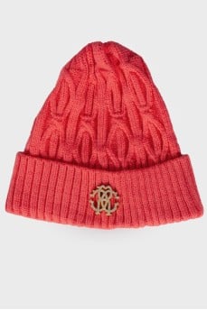 Bright pink hat with a brand logo