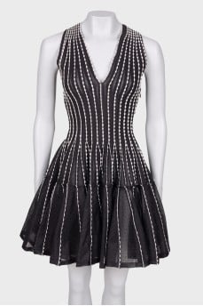 Translucent dress with decorative trim
