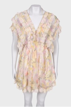 Dress with lace and brushes