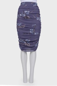 Skirt with drape with a tag