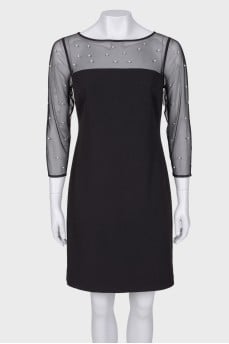 Dress with translucent sleeves and pearls