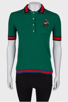 Polo with an application on the chest