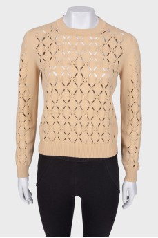 Jumper with a cut -out pattern