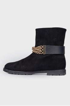 Leather boots with a gold chain