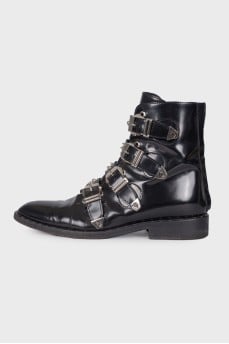 Boots with straps and spikes