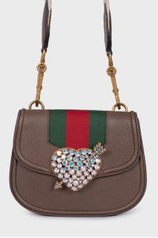 Bag with appliqué and wide strap