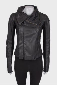 Leather jacket with knitwear on sleeves