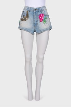 Denim shorts with applications