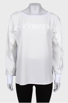 White frilly blouse
