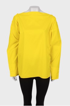 Yellow blouse on rivets