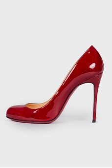 Red patent heel pumps
