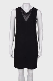 Black dress with a translucent insert on the chest