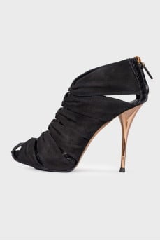 Shoes with golden heels