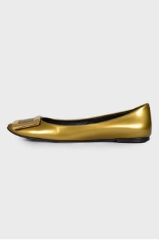 Gold leather ballerinas