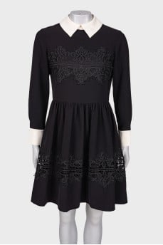 Black dress with white collar and cuffs