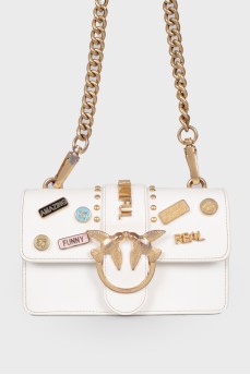 White bag with decorated flap