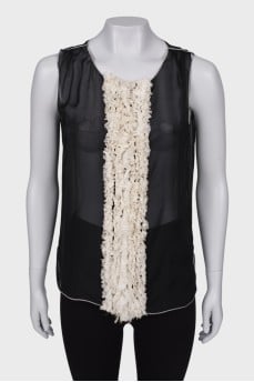 Sleeveless translucent blouse