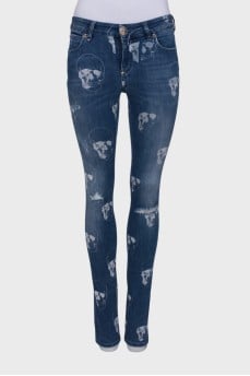 Skull jeans with distressed effect