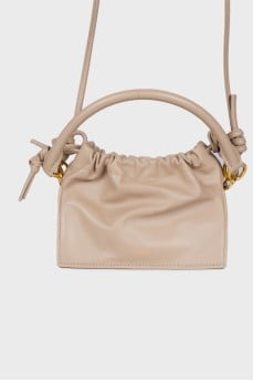 Leather bag with a thin strap