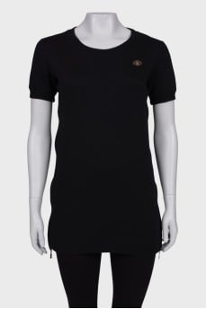 Black tunic with gold fittings