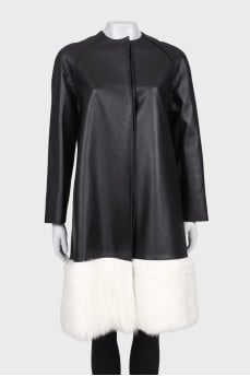Leather coat with white fur on the hem