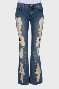 Flare jeans with distressed effect