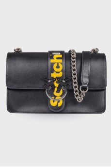 Leather black bag on a chain