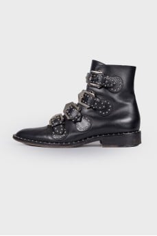 Black leather boots with straps