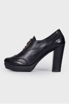Black lace-up ankle boots