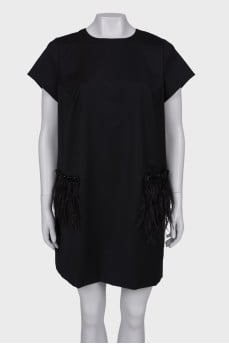 Dress with feathers on the sides