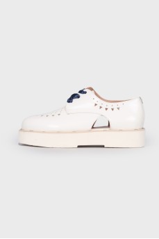 White lace-up loafers