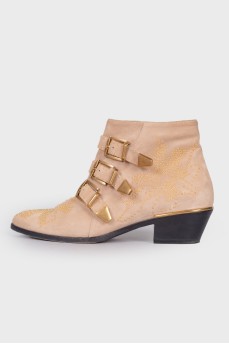 Suede cossacks with golden rhinestones