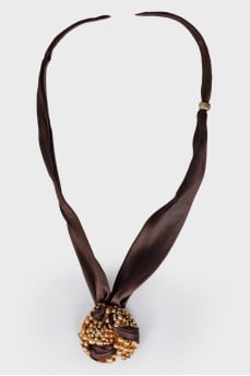 Textile and silver necklace