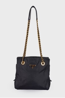Textile bag with triangular logo