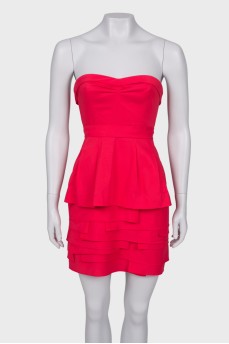 Red dress with frills, with a tag