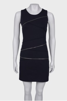 Dress with a decorated zipper