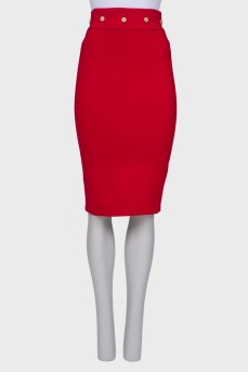 Red skirt with golden fittings