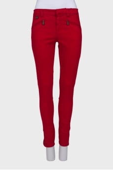 Red jeans with zipper pockets