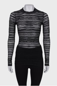 Translucent black top with tag
