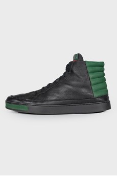 Men's black sneakers with green inserts