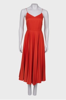 Orange dress with pleated skirt
