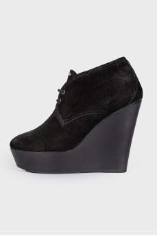 Black high wedge ankle boots