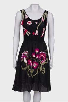 Black dress with embroidered skirt