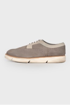 Men's gray brogues with white soles